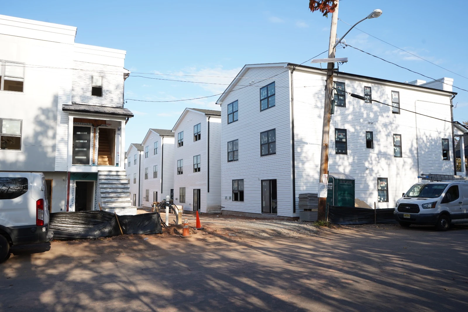 Active Linden construction site with equipment and residential framing